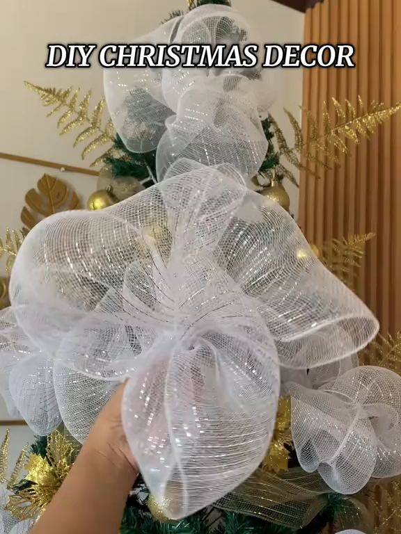 This is how I made the design for our Christmas tree ☺️ You can get it cheaper if you just do it like this, one roll is 10 yards and you can make 6pcs of DIY flower decor #decorchristmas #ribbon #meshroll #Xmas #Christmas