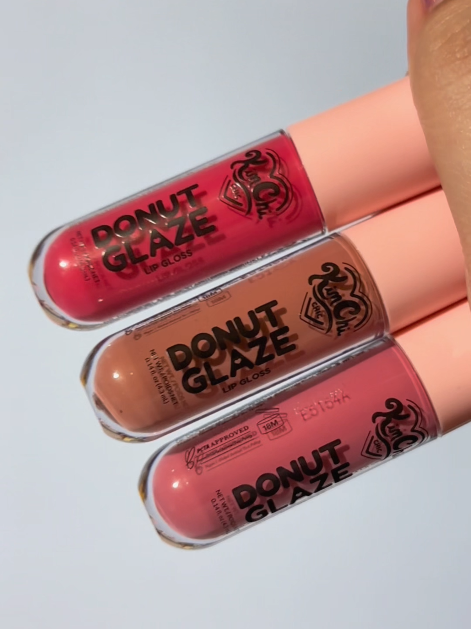 Experience the flavors and the lightweight shine of our new Donut Glaze lip glosses! ✨🍩 Grab all 3 shades here on Tiktok Shop ✨ Tap to shop! #donutellahamachi #kimchichicbeauty #donutglaze #lipgloss