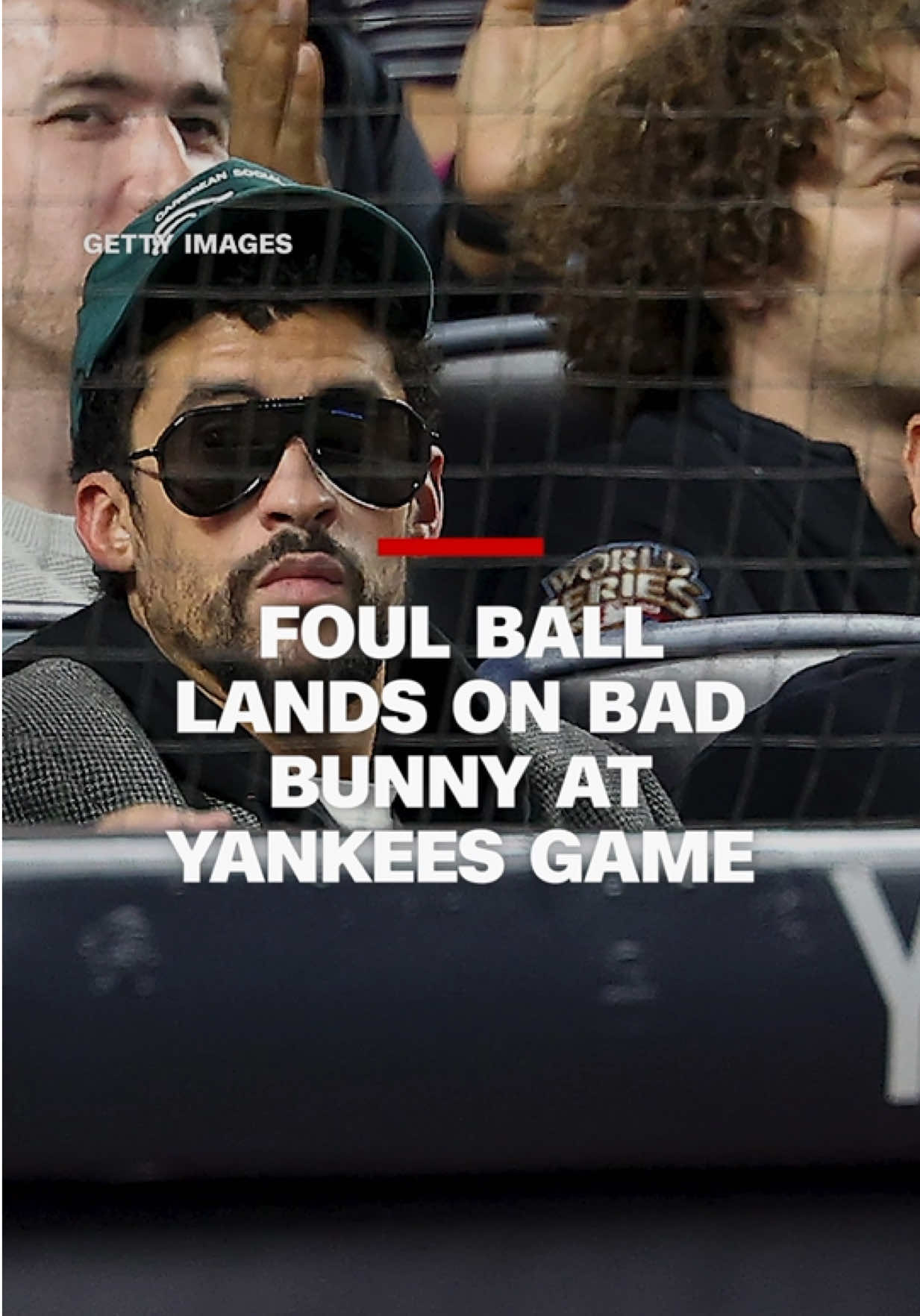 Bad Bunny was hit by a foul ball at at a Yankees vs. Blue Jays game on Tuesday night. The moment has gone viral after the rapper picked up the ball which landed near his seat. #cnn #news 