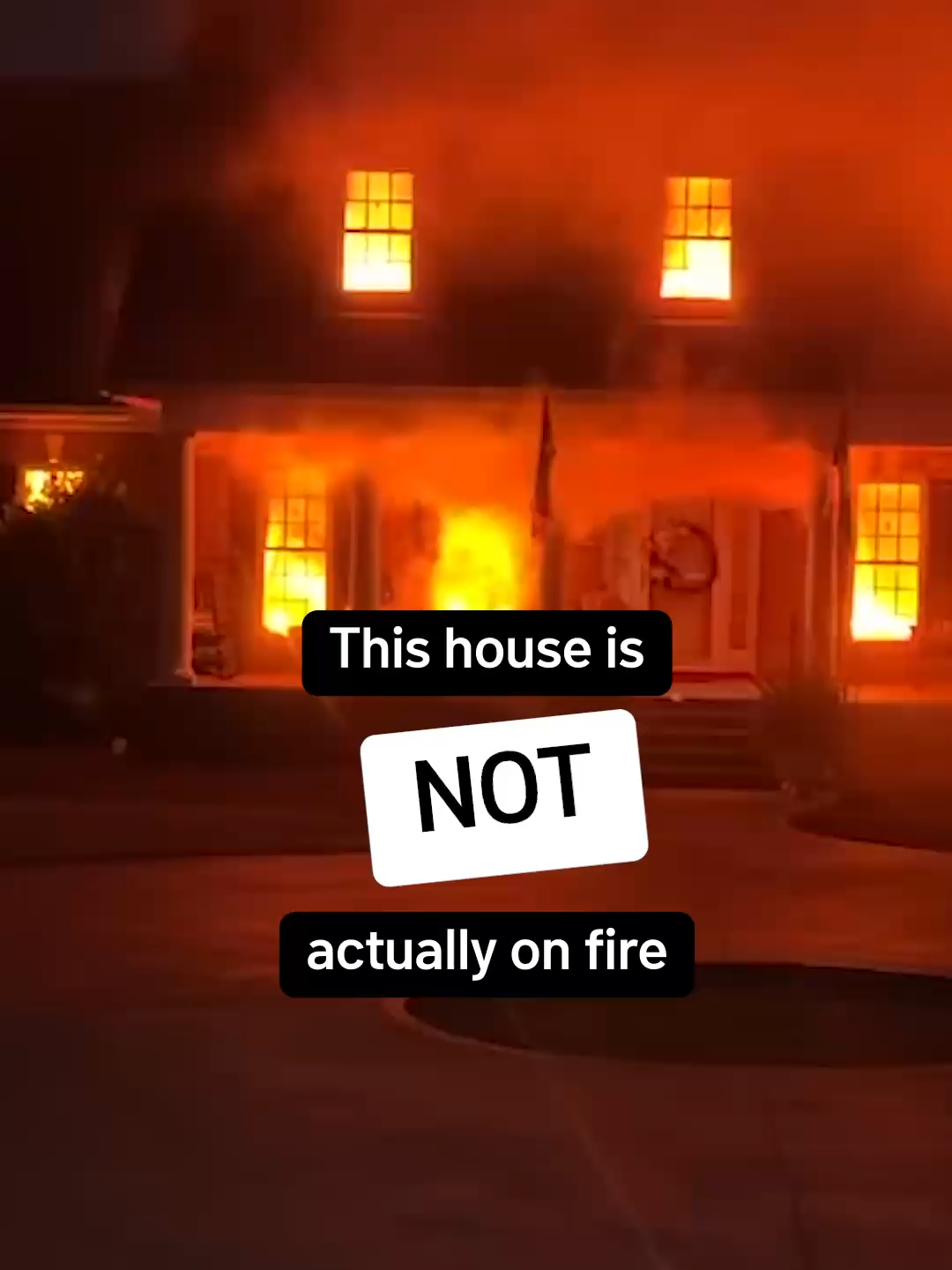 This house is not actually on fire. It's a Halloween display. The homeowners are once again begging their neighbors: “Please do not call the fire department! See the link in our bio to learn more.