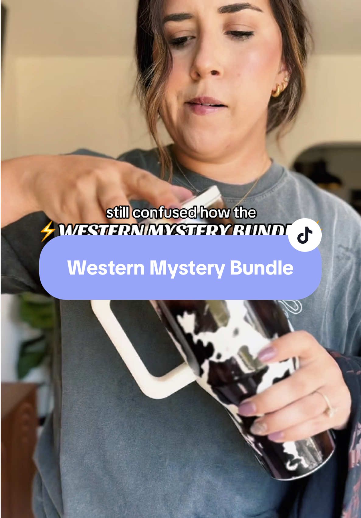 Still scratching my brain how this works?? The purse alone.. guys just get this before the sale ends today!! @Dani Morgan’s Boutique  #TikTokShopFinds   #CowgirlSurpriseBox   #WesternStyleHaul   #DaniMorganBoutique   #WesternMysteryBundle 