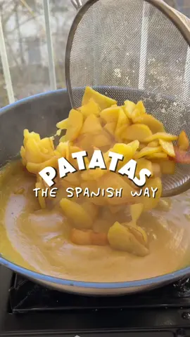 PATATAS THE SPANISH WAY #1: Patatas en paseo 💃 Here’s one of many recipes to prove andalusian cuisine deserves recognition due to creativity. This recipe is perfect as a vegan tapa, but also works amazing as a side dish with your meat or fish.  RECIPE 4-5 potatoes 1 onion 7 garlic cloves (4 for the sauce, 3 for frying the potatoes) 1 tsp chilli flakes 1 tbsp Orégano 1 tbsp Cumin 1 tsp Turmeric 1 cup of white wine 1 cup of water One white bread bun Parsley Salt Pepper Olive oil Peel and cut the potatoes as seen in the video. Confit them with oil at around 130°C for 10 minutes, and raise the hit for the last 5 minutes so they get golden brown. (times may depend on the variety and size of your potatoes).  Stir-fry the garlic from cold oil. Once it’s getting golden, add the onion and sautée for around 10 minutes at high heat. We want the veggies to get some colour, as seen in the vid. It’s the base for developing a tasteful sauce later.  Once slightly caramelized, drop the spices in and toast them for around 2-3 minutes. Then, deglaze all the maillard reactions attached to the pot by adding the white wine and cooking all together for around 5 more minutes. Reserve the sauce in a blending jar, and in the same pot, add a pinch of olive oil and toast the bread there. Use the bread as a sponge, to collect all the leftovers of the pot. Blend all together with some extra water if needed, until a smooth texture.  Bring the sauce back to the pan, add the potatoes, and mix with round movements to avoid breaking the potatoes too much. Cook for 2 more minutes to stabilize all the flavors together, and this is ready to serve with a pinch of chopped parsley.  #spanishfood #patatasthespanishway #potatoes #Recipe  
