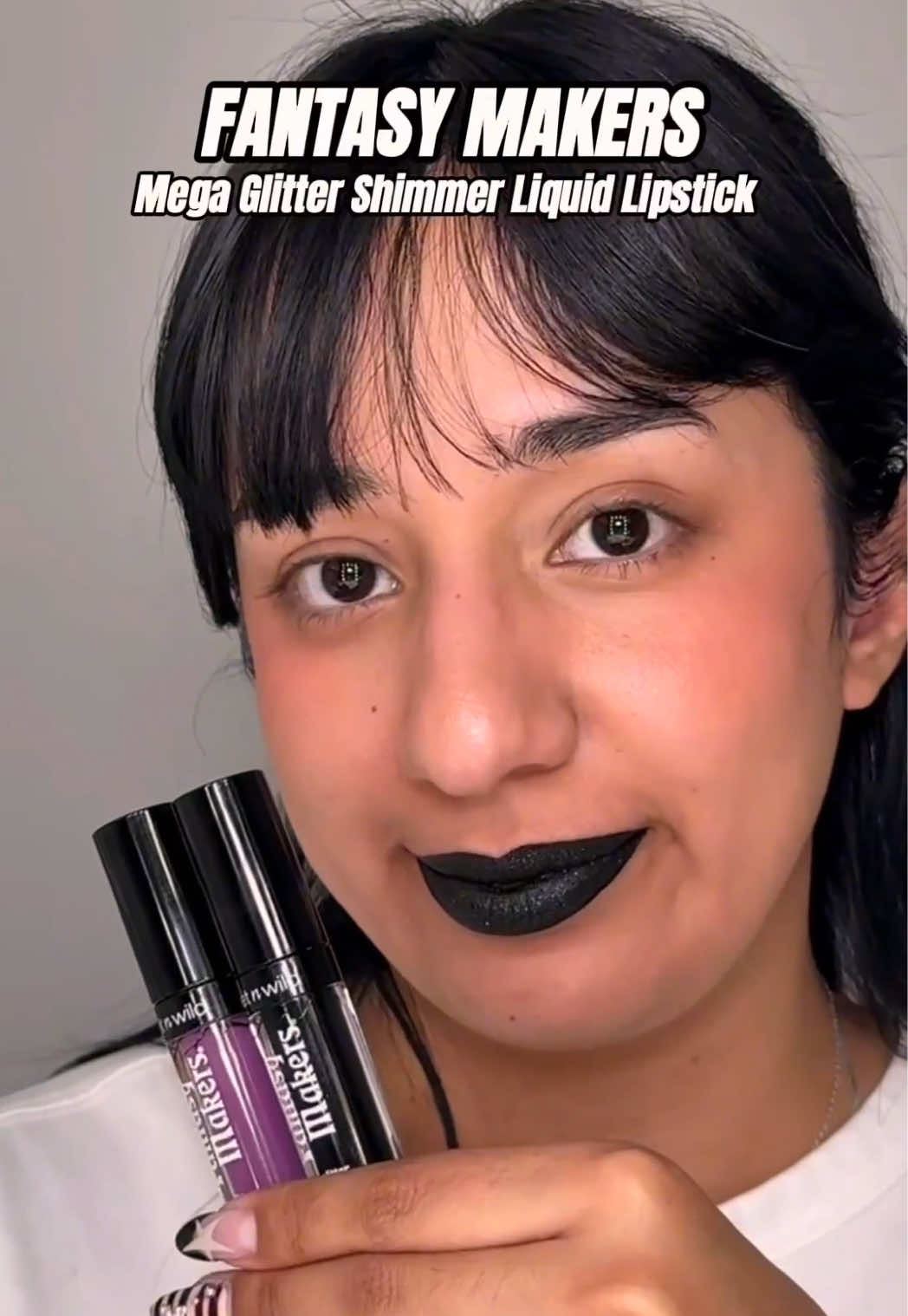 What sorcery is this? 🪄 🤔 It's our Mega Glitter Shimmer Liquid Lipsticks in NEW shades for Halloween! 🎃 This innovative formula applies matte, sets and transforms to a glitter finish with a press of the lips ✨⁠ ⁠ Available in two NEW highly anticipated shades: ⁠ 🖤 Spellbound⁠ 💜 Witchful Thinking⁠ ⁠ Shop the Fantasy Makers collection NOW @walmart (online & in-store) @target @cvs_pharmacy @walgreens ⁠@fivebelow @amazon & wetnwildbeauty.com ⁠