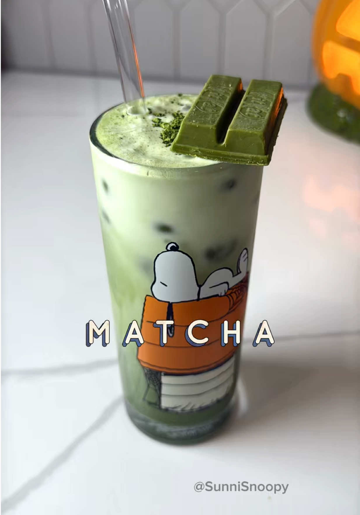 Matcha 🍵 latte with some cream on top.  Halloween cup is pretty cute with matcha green. Added kitkat matcha on top. Enjoy! #snoopy #peanuts #matcha #matchalatte #matchalover      