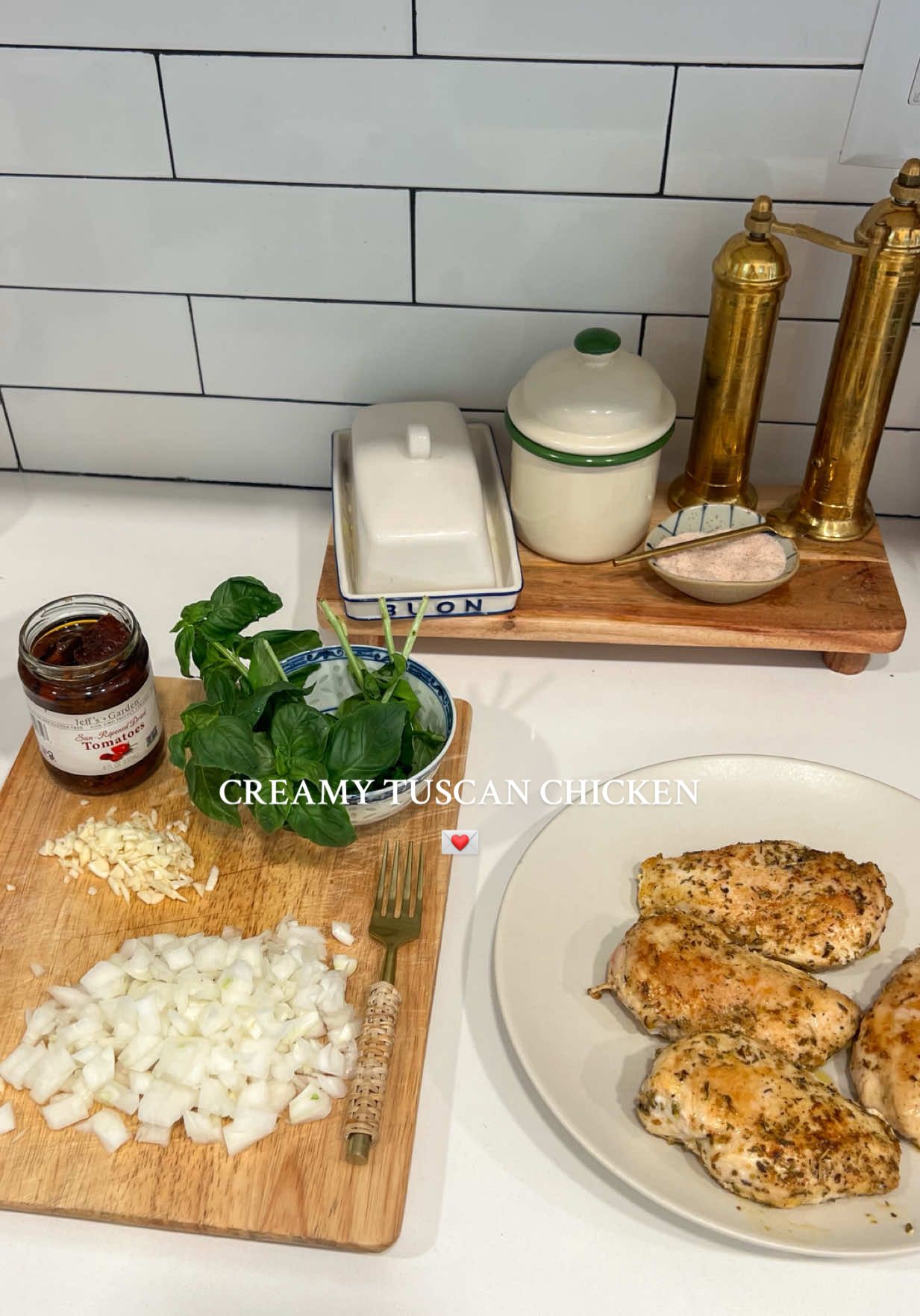 such a yummy cozy dinner!!  RECIPE: ingredients: • 4-5 chicken breast • olive oil  • 1 tbsp italian seasoning  • 2 tsp garlic powder  • 1 tsp paprika  • salt & pepper • 1/2 sweet onion  • 3 garlic cloves (minced) • 1 cup bone broth  • 1 cup cream  • 1-2 cups spinach  • 2 tbsp chopped basil  • 1 cup sundried tomatoes (chopped) • 3/4 cup parmesan cheese  • salt & red pepper flakes  instructions: - heat skillet with olive oil over medium heat - drizzle chicken with olive oil & spices, mix well  - place chicken in heated skillet & cook for a few minutes until browned and then flip & repeat. once done remove chicken & set aside  - add butter to pan, once melted add in onions & garlic. sauté for a few minutes - add in shndried tomatoes and stir  - pour in bone broth & cream. mix well - add parmesan cheese & stir till melted, then add in chopped basil  - let spinach wilt in skillet & then add in chicken and bring to a simmer  - cook until sauce has thickened & chcikne is fully cooked  - serve over bone broth rice or pasta, top with fresh basil, salt & red pepper flakes & spoon more sauce over!! - enjoy!!   #DinnerIdeas #dinner #cookwithme #chickenrecipe #tuscanchicken 