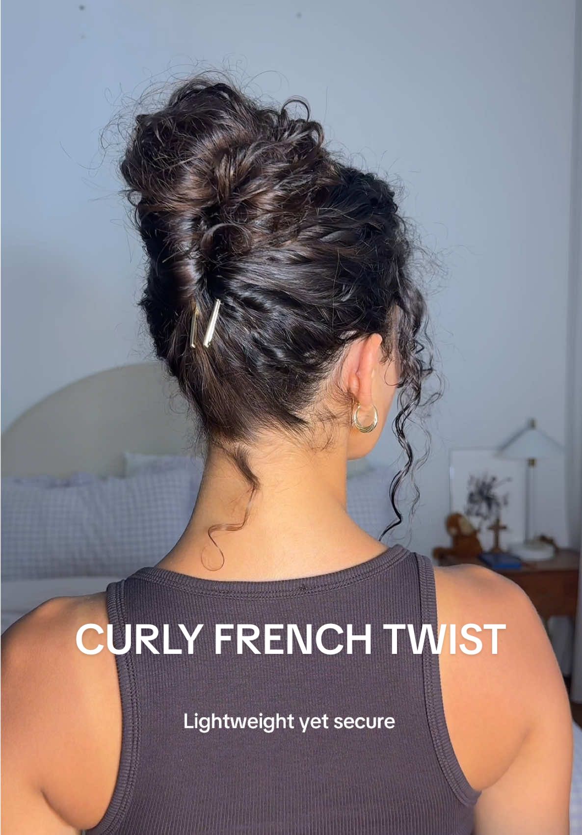 The perfect & easy curly french twist 🦋🦋 I tried to breakdown my process as much as possible for you all, showing each individual step! This is my absolute favourite hairstyle for curly girls. It’s soft, romantic and effortless whilst being easy to achieve once you get the hang of it. I used this stunning gold French Pin by @Lady Jayne for a snag free, super secure twist and detangled/styled my curls with their Infinity Vent Detangling Brush. For finishing touches I loved the Chrome Shine Brush to smooth down any frizz! <3 Available at @Chemist Warehouse Official #ladyjanehair #curlyhairstyles #frenchtwist #paidpartnership 