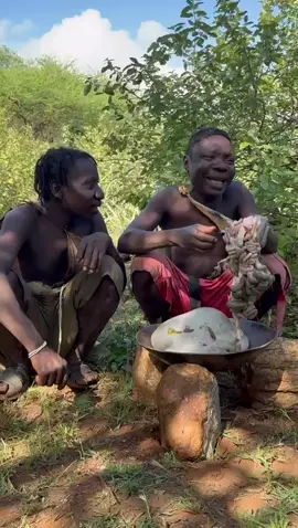 “Chef Chaba in action 👨‍🍳🔥” “Our favourite Chaba is cooking meat today — looks like a feast is on the way for lunch! 😋🔥 Can’t wait to see his secret tribal recipe 😄🍖” ⸻ #HadzabeTribe #TribalLife #CookingVibes #CulturalExperience #TribalEats
