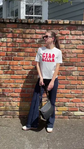 Spotted in the wild: Concert Indigo Jeans, Saben Fifi Bag, and Paradiso Ciao Print Tee. Shop now and steal the look before it’s gone! @amongthebravelabel @storiesbetoldlabel @sabenltd