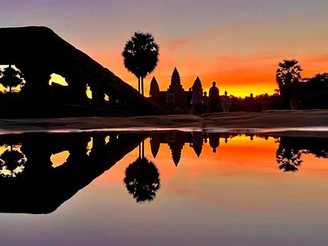Witnessing the sunrise at Angkor Wat temple is a magical experience. Golden rays illuminate the iconic towers, reflecting perfectly in the serene moat. The ancient stones glow, revealing intricate carvings and timeless beauty. As day breaks over Cambodia’s most famous monument, visitors are embraced by peace, history, and awe-inspiring splendor. #AngkorWat #SunriseMagic #CambodiaTravel #AncientWonder #creatorsearchinsights 