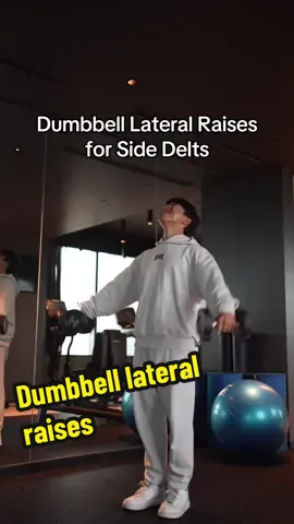 If you’re struggling with training your side delts on dumbbell lateral raises, I’m willing to be this will surely help. Here’s how to optimize the movement to best bias the side delts #fyp #Fitness #gym #bodybuilding 