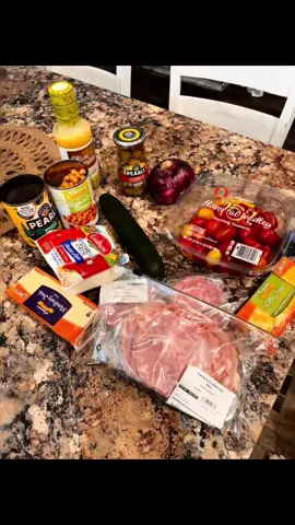 Tortellini pasta salad  Black olives  Green olives  Chickpeas  One cucumber One red onion Salami Ham Pepperoni Cherry tomatoes And any Italian seasoning your choice I used Olive Garden creamy Italian .  Cook your pasta rinse it under cold water. Add your ingredients and mix store an airtight container in the refrigerator until you’re ready to serve great for bringing to parties or any get togethers. Enjoy!  Mozzarella cheese Or cheese of choice I use Munster .