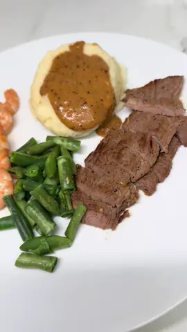 Surf & turf dinner done right 🥩🍤 creamy mashed potatoes with gravy, sautéed shrimp, tender steak slices, and a side of green beans simple, balanced, and delicious 💪✨ #DinnerGoals #SurfAndTurf #HealthyMeals #BalancedPlate #ProteinPacked      