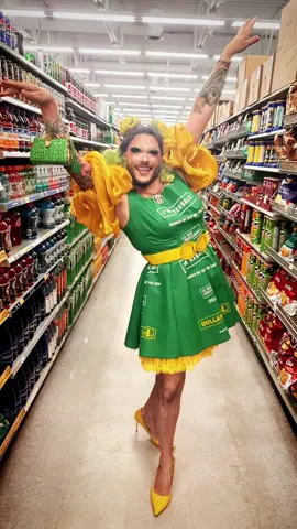 “I’m reusable!” Step aside, high fashion; it’s time for cheap couture! This eye-catching dress, crafted entirely from Dollarama shopping bags, is here to slay. Who says you can’t be fabulous and sustainable? Shot in the aisles of Dollarama, I had a blast pretending to stock shelves while serving looks that scream fierce and eco-friendly. This Halloween, let’s show the world that style doesn’t have to break the bank! Dress by @ginnytonyk  Makeup by @ginnytonyk  Styling by @ginnytonyk  Wig by @wigsbysire  📸 @defiance_1 @diannegibsongirl  #GinnyTonyk #SustainableFashion #CheapCouture #UpcycledStyle #EcoChic           @Dollarama @dollarama_deals @dollaramafindsca