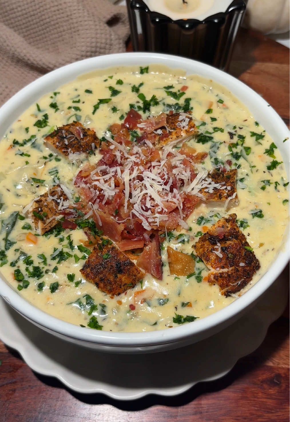 Chicken gnocchi soup ✨ Ingredients  Chicken - 1 lb boneless chicken breast, shredded - 2 tsp garlic powder  - 2 tsp onion powder  - 2 tsp oregano  - 1 tsp basil - 1 tsp thyme (optional) - 1 tsp smoked paprika  - 1 tsp salt  - 1/2 tsp black pepper - 2 tsp olive oil (for marinade) - 1 tbsp butter (cooking) - 1 tbsp olive oil (cooking) Soup - 16oz gnocchi - 1 cup carrots, diced - 2 celery stalks, diced - 1 yellow onion, diced - 6 garlic cloves, minced - 4 cups chicken stock - 2 cups whole milk - 1 1/2 cup heavy cream - 2 oz cream cheese - 1/2 tbsp chicken bouillon paste (optional) - 1/4 cup flour  - 2 tbsp olive oil - 2 tbsp butter - 2 cups spinach, chopped - 2 tsp garlic powder  - 2 tsp onion powder  - 1 tsp oregano  - 1 tsp basil - 1/2 tsp thyme - 1/2 tsp nutmeg  - Salt and pepper to taste - Bacon (for garnish) - Parsed (for garnish)  Instructions  - In a large pan heat 1 tablespoon of olive oil and butter over medium heat. Add the chicken and cook until browned and cooked through, about 7-10 minutes. Remove the chicken from the pot and set it aside. - In a large Dutch oven add olive oil and butter. Add the diced onion, carrots, and celery. Cook for about 5-7 minutes, or until the vegetables begin to soften. Add the minced garlic stir for one minute until fragrant. Add flour and mix until well combined  - Pour in the chicken broth, and chicken bouillon paste stirring to combine. Add milk, heavy cream, and stir until well combined. Add cream cheese and mix well until creamy and melted. - Add in spices (garlic powder, onion powder, salt, pepper, nutmeg, basil, and oregano.) Season to taste, add more or less. - Add shredded chicken, chopped spinach, and mix until well combined. Bring the soup to a boil, then reduce the heat to medium-low. Let it cook for about 25 minutes, allowing the flavors to meld. - Stir in the cooked gnocchi , mix well and serve soup and garnish with parsley, Parmesan cheese, bacon bits, and pepper flakes. Enjoy!  • • • #Recipe #chickenrecipe #fallrecipes #DinnerIdeas #soup 