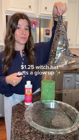Who knew a $1.25 Dollar Tree witch hat could look this good?! This easy DIY makes the perfect fall or Halloween party centerpiece,  all you need is a little Mod Podge Stiffy, spray paint, and some faux florals in rich fall tones. Use what you already have around the house!  Here’s how I made it: 1️⃣ Grab a basic witch hat from Dollar Tree (it’s the soft, floppy kind). 2️⃣ Brush on Mod Podge Stiffy to help it keep its shape as it dries. It gave it a little extra shape, but works better on cloth! 3️⃣ Once dry, spray paint the hat black to cover any patterns (unless you can find a solid one). 4️⃣ Hot glue faux florals in a cascading design down one side. I used a mix of oranges, browns, and deep reds for that moody autumn vibe. It’s so simple, but it looks like something straight out of a boutique Halloween shop! 🕯️ Follow for more frugal DIYs, holiday inspo, and fun ways to style your home beautifully on a budget. #dollartreediy #halloweendecor #witchhatdiy #falldecorideas #budgetfriendlydecor         