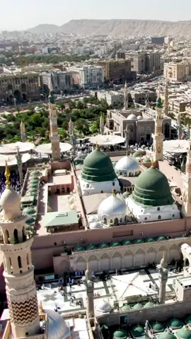 Madinah, the City of the Prophet, shines bright A beacon of faith, where Islam's history takes flight The Masjid an-Nabawi, a mosque of grandeur and might Where the Prophet Muhammad's tomb is a sacred sight The city's streets are lined with date palms, green and tall A tranquil oasis, where faith and peace enthrall Madinah's rich history and heritage are palpable and real A place where Muslims from all over the world come to feel The city's warm hospitality and welcoming smile Make it a place of pilgrimage, worth traveling a long while