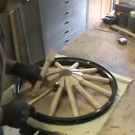 A wooden frame on an iron wheel project #wood #woodwork #woodwking #carpenter 