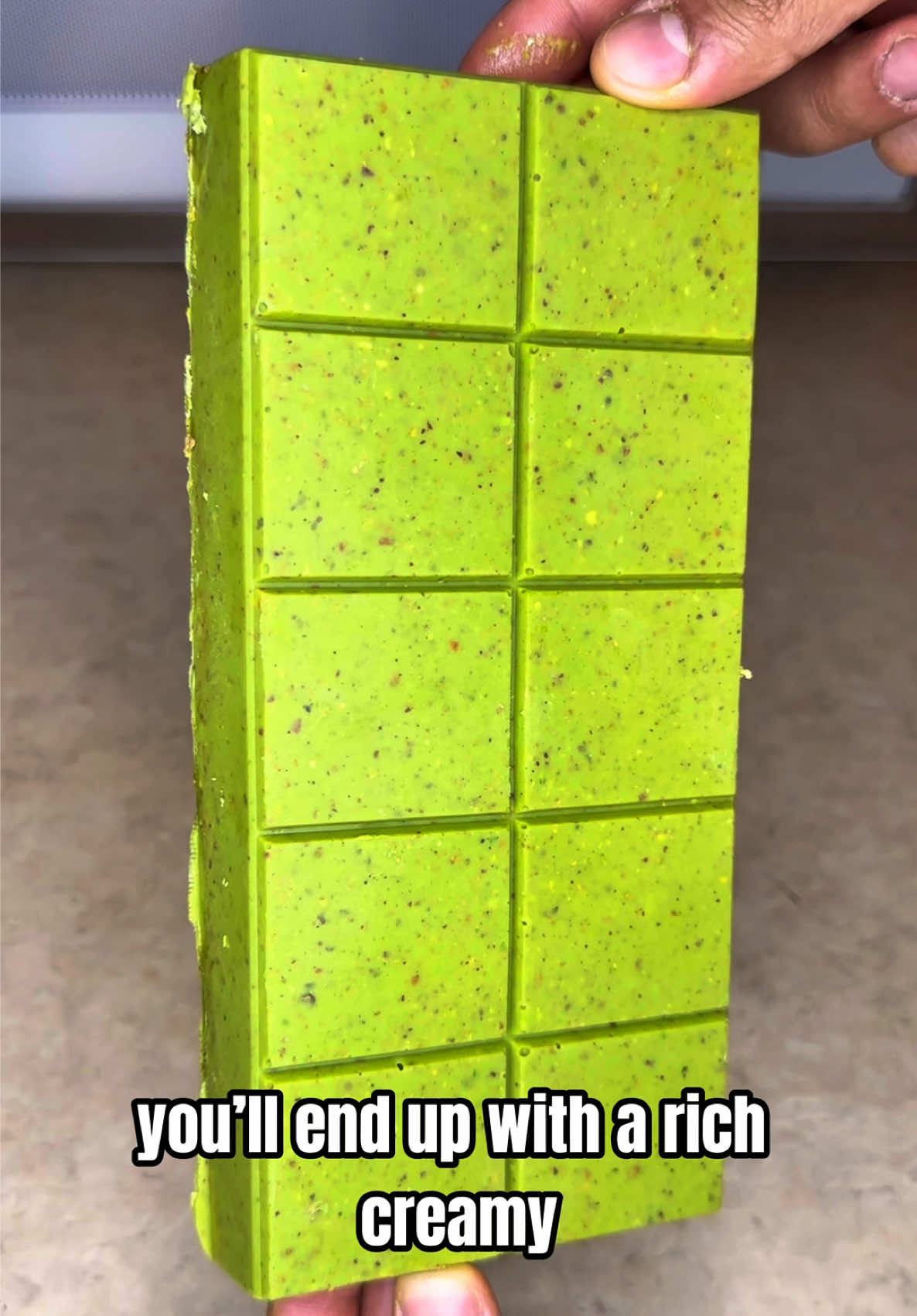 🍫💚 LUXURY IN EVERY LAYER: Pistachio-Filled White Chocolate Bars A harmony of creamy white chocolate, roasted pistachios, and golden crunch — smooth, delicate, and irresistibly indulgent. ⸻ ✅ The steps to crafting your own Pistachio-Filled White Chocolate Bars: 1. The Pistachio Chocolate Shell 💫 In a heatproof bowl, melt and whisk until silky-smooth: • 1 cup sugar-free white chocolate 🍫 • 1 cup pistachio butter 💚 Pour half of this velvety blend into a chocolate bar mold (approx. 13 x 8 cm / 5 x 3 inches, 12-square format). Freeze for 10–15 minutes, until lightly set and glossy. ⸻ 2. The Heart of Pistachio Bliss 🌰 In a bowl, combine: • ⅓ cup pistachio butter • ½ cup chopped pistachios • ½ cup golden knafeh (crumbled for a refined crunch) ✨ Once the base shell is set, spoon the pistachio filling evenly across each square — a core of creamy, nutty texture waiting to be sealed. ⸻ 3. The Final Pour 🍫 Gently pour the remaining pistachio chocolate mixture over the filling to fully cover it. Smooth the surface with a spatula for a flawless, mirror-like finish. ⸻ 4. The Freeze ❄️ Return the mold to the freezer for 20–30 minutes, allowing each bar to firm into a perfect, creamy structure. ⸻ 5. The Indulgent Break 💚 Unmold, snap into squares, and admire the luscious pistachio center — creamy, crunchy, and luxuriously smooth. Every bite is a celebration of pistachio elegance and pure, guilt-free pleasure. #pistachio #chocolate #dubaichocolate #chocolatelover #viral              