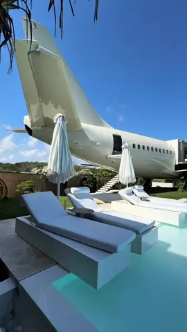💰 $3,000 per night for one of the world’s most unique stays — a Boeing 737 turned into a luxury Airbnb villa in Bali. Perched on the cliffs of Nyang Nyang Beach in Uluwatu, this former passenger plane now offers: ✈️ 2 bedrooms (including one in the cockpit) 🛁 Jacuzzi in the cockpit with panoramic ocean views 🏊‍♂️ Infinity pool hanging over the cliff edge 🌅 Walkable airplane wings for epic sunset shots 🔥 Outdoor fire pit & private helipad This Private Jet Villa is 150 meters above the Indian Ocean — the perfect mix of insane engineering and luxury travel. 📍 Location: Nyang Nyang Beach, Uluwatu, Bali 💰 Price: $3,000 USD per night (Airbnb rates may vary) Would you stay here or is this just too crazy? #bali #balivilla #uluwatu #privatejet 