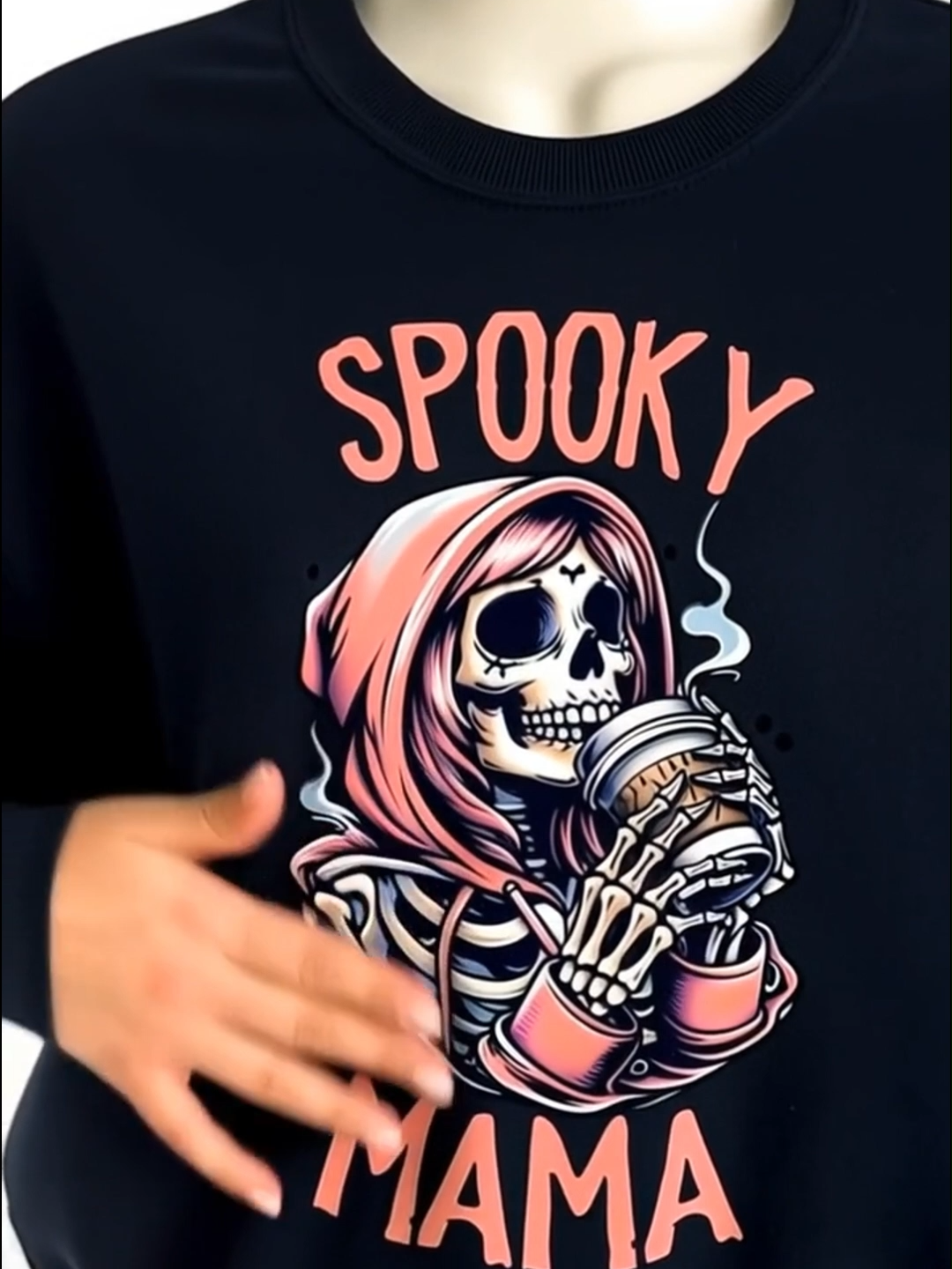 For every mama who runs on caffeine and Halloween vibes ☕💀 This “Spooky Mama” sweatshirt keeps it cute, cozy, and a little creepy — perfect for fall coffee runs or spooky season selfies! 🍂 #SpookyMama #HalloweenStyle #FallFashion #CozySeason #fyp