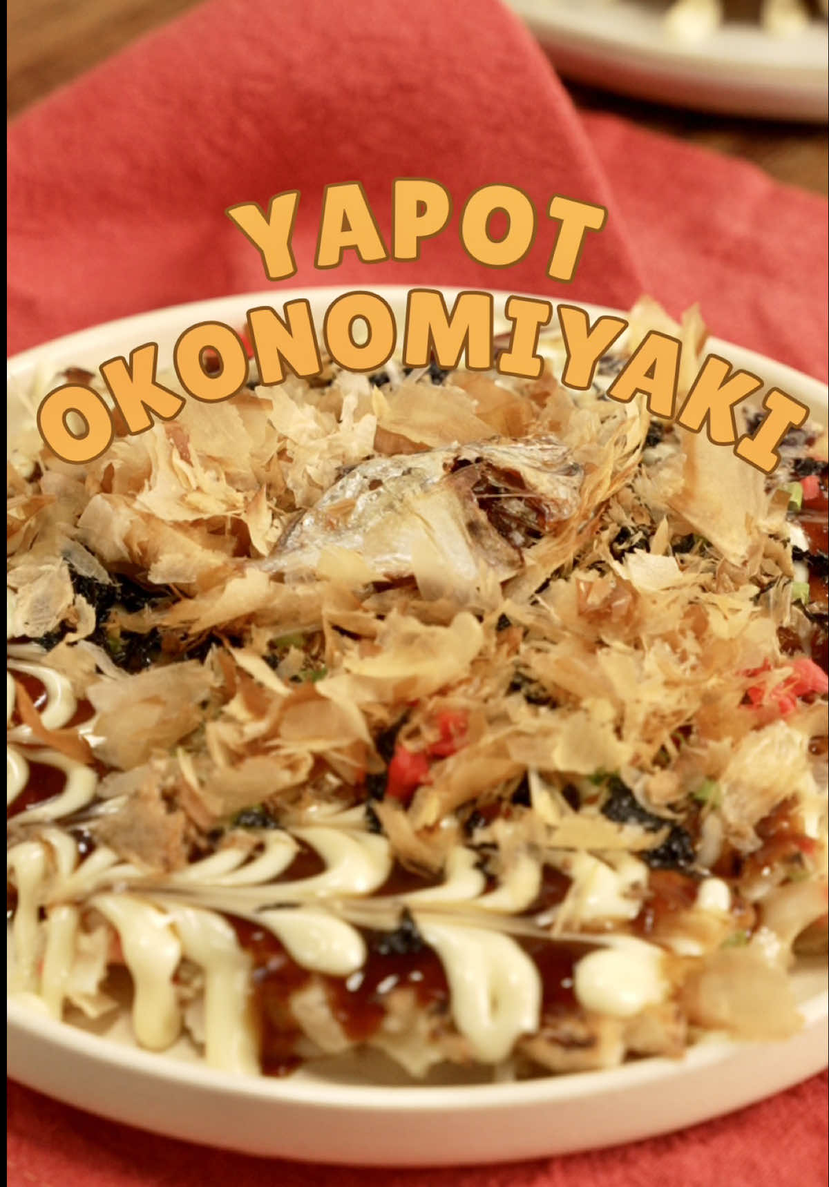 What if we made okonomiyaki a little bit more Filipino? Since we have an abundance of fish like Japan, we added some yapot fish that we got as a pasalubong from Sorsogon. Check this out! 🐟  YAPOT OKONOMIYAKI Ingredients: Batter: 1 cup all-purpose flour ⅔ cup water + ¼ tsp patis/fish sauce 1 pc egg Filling: 1-½ cups chopped cabbage 3 tbsp chopped pickled ginger ¼ cup chopped green onions ½ tsp salt ¼ tsp pepper ¼ cup chopped crispy fried yapot (dried fish) oil for cooking Toppings: mayo okonomiyaki sauce chopped fried yapot katsuobushi (bonito flakes) seaweed flakes chopped spring onions Procedure: 1. Combine flour, water, and egg. Fold in the cabbage, ginger, and green onions. Season with salt and pepper.  2. In a pan with hot oil over low heat, add ½ cup of the mixture. Add chopped yapot. Cover the pan and cook for 1-2 minutes.  3. Flip the okonomiyaki and cook for another minute. Place onto a plate and garnish with mayo, okonomiyaki sauce, katsuobushi, yapot, seaweed flakes, and spring onions. Makes 4 servings. #fyp #featrmedia #okonomiyaki #yapot 