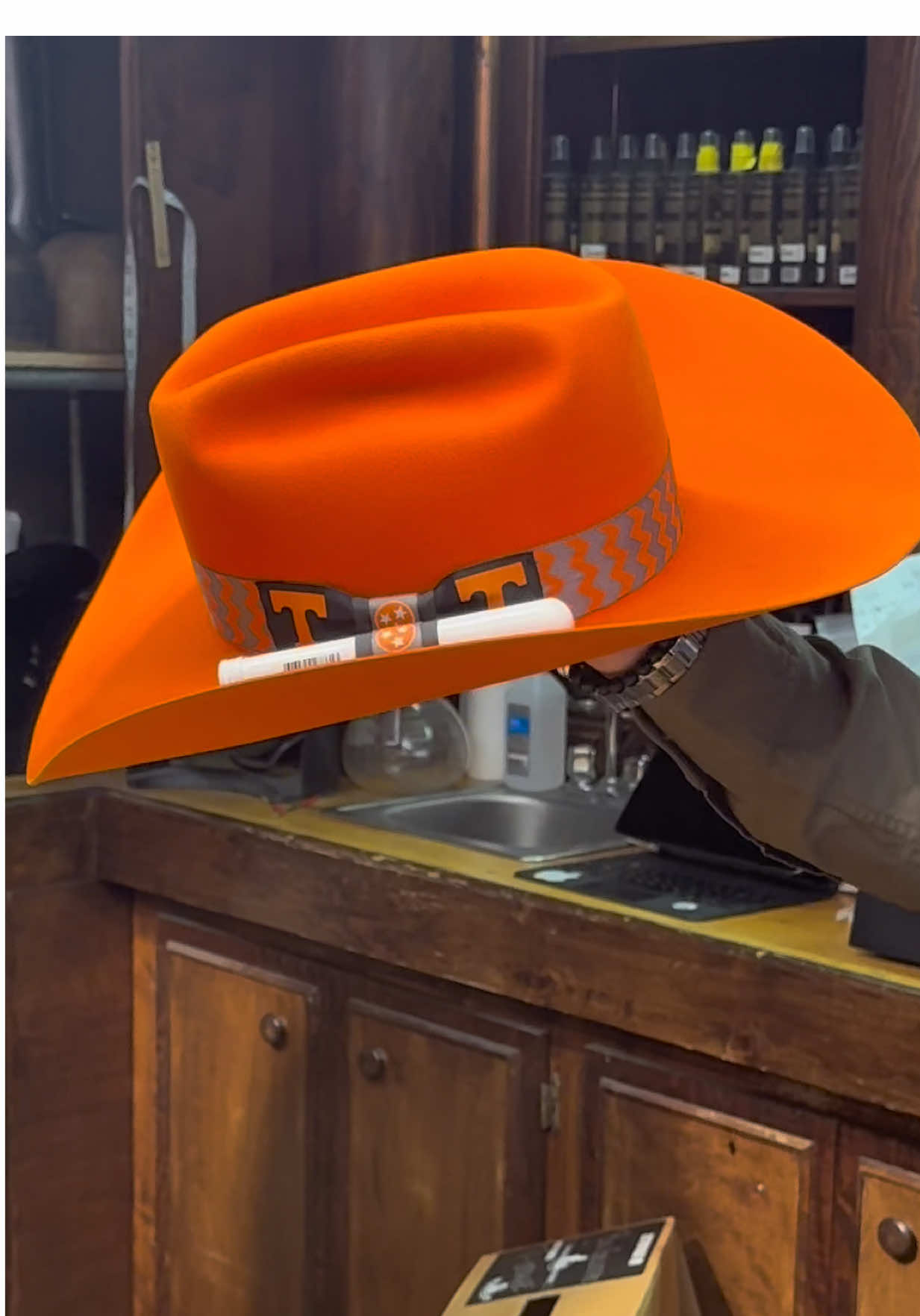 Check out this custom hat Trent Johnson from Greeley Hat Works crafted for our customer! 🏈🍊 Come see us today for the final day of our GHW Trunk Show and let Trent build yours!