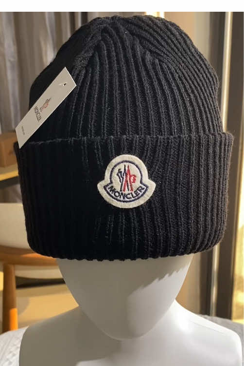 Stay cozy and chic with this black ribbed knit beanie. Crafted for warmth and comfort, it’s perfect for chilly days. The versatile design suits every occasion, keeping you stylish while beating the cold.#fyp #moncler #hat #fashion #tiktok 