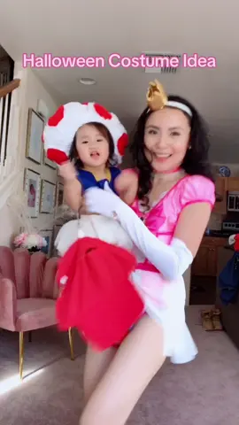 Halloween Costume Idea Princess Peach and baby toad. #halloween #halloweencostumes #halloweencostumeidea #princesspeach #familyhalloweencostume 