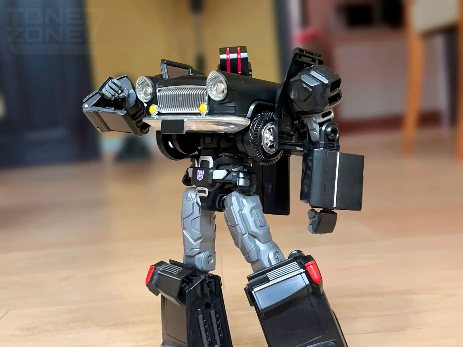 A custom I’ve worked on during my spare time over the last few months — a proper action figure for one of the more unusual transformers to grace the franchise, and a personal fav: Decepticon Blackwall Having a very minor role during IDW2005’s run of comics, Blackwall served as Megatron’s personal transport during his rise to political power. With an imposing stature, and a cold, otherworldly set of eyes, Blackwall stayed extremely loyal to the cause. Even until his demise, by the hands of his old rival: Grimlock  • The base figure that’s used, is a cheap transforming toy from China. Modeled after transport vehicles used by Chinese politicians. This figure was selected for the following reasons: 1.) It’s the same size as SS86 Grimlock (Canon height) 2.) The alt mode reflects his role as a politician transport 3.) The alt mode is also a nice nod to the old G1 children’s book depicting Megatron riding in a similar vehicle  4.) The toy’s robot mode bears uncanny resemblance to this “Earthmode” Blackwall fanart by luisu L, which was a key inspiration for this project  5.) It was already in the intended colors • Modifications to the toy include: 1.) New articulated hands and fingers  2.) Lego Technic neck joint  3.) Custom knee joint swivel 4.) Hand sculpted Blackwall head #transformers #custom #toys #DIY #photography 