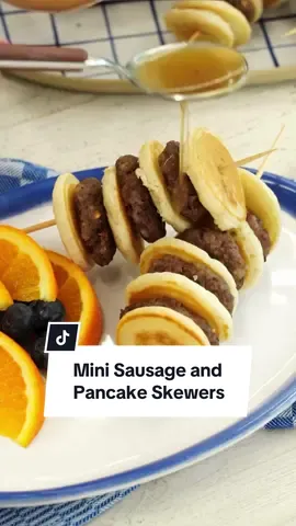 Some like them hot! 🥞🌶️ You didn’t know you needed these Mini Sausage Pancake Skewers in your life! The spicy drizzle kicks up the sweetness of your pancakes, making them the perfect brunch addition! Continue reading or click the link in the @allrecipes bio for the full recipe! ⬇️ Ingredients: Syrup: 4 tablespoons unsalted butter ½ cup maple syrup 1 teaspoon red pepper flakes, or to taste ½ teaspoon salt Pancakes: 1 cup all-purpose flour ½ tablespoon brown sugar ¼ teaspoon baking powder ¼ teaspoon salt 1 cup buttermilk 1 large egg 2 tablespoons sour cream 2 tablespoons unsalted butter, melted 2 teaspoons maple syrup 1 tablespoon olive oil 1 pound bulk regular pork sausage (such as Jimmy Dean®) 13 4-inch bamboo skewers Directions: Gather the ingredients. Melt butter over medium-low heat in a small saucepan. Stir in maple syrup, red pepper flakes, and salt. Bring to a boil and cook, 3 to 4 minutes. Remove syrup from heat and set aside, stirring occasionally, for at least 30 minutes for flavor to fully develop. Meanwhile, prepare pancakes: whisk flour, sugar, baking powder, and salt together in a large bowl. Whisk buttermilk, egg, sour cream, melted butter, and maple syrup together in a separate bowl. Pour the wet ingredients into the flour mixture. Stir gently until just combined but slightly lumpy; do not overmix. Let sit for 10 minutes. Heat a large nonstick skillet or griddle over medium heat. Drop teaspoonfuls of batter onto the hot skillet to form 1-inch diameter pancakes. Cook for about 1 to 2 minutes, flip, and continue cooking until golden brown, about 1 more minute. Transfer cooked pancakes to a plate and repeat with remaining batter. Heat olive oil in the same skillet over medium heat. Form tablespoonfuls of sausage into 1-inch patties, the same size as the mini pancakes. Cook until patties are cooked through, about 3 minutes per side. Transfer to a paper towel-lined plate. Thread 3 pancakes and 2 sausage patties onto each skewer, starting and ending with a pancake. Repeat to make remaining skewers. Serve with spicy syrup. 🧑‍🍳: Nicole #maplesyrup #minipancakes #skewers #breakfastfood  #pancakes