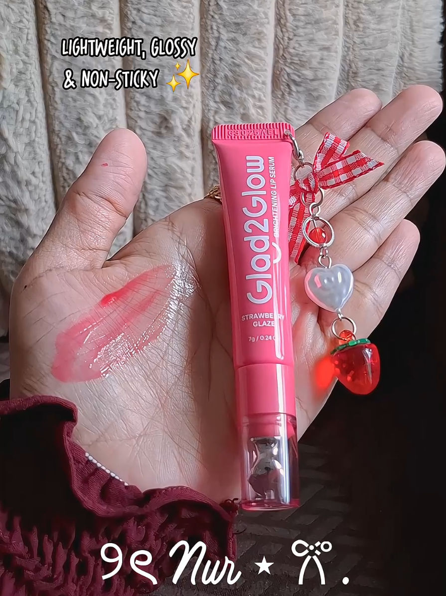 The Viral Glad2Glow Brightening Lip Serum 💋🎀  Comes with attached cute charm! #glad2glow  #glad2glowlipserum  #glad2glowbrightening  #createtowin  #weeklywedrush 
