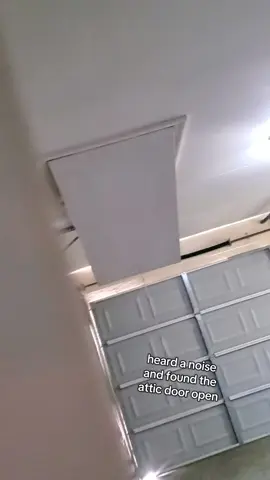 I heard a banging noise in the garage and when I went to check I found the attic door open. The moment I stepped out into the garage it slammed shut by itself, so I went up into the attic but of course there was no one there. Has to be a ghost. Another day in my haunted house y'all...I'm scared #haunted #hauntedhouse #creepy #creepytok #creepytiktok 