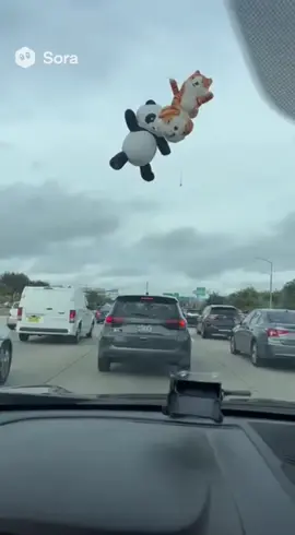 Inflatable animals land on freeway! 🤯 #cat #dog #panda #ai #sora