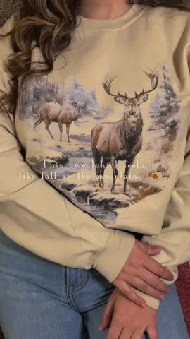 If winter had a uniform — this would be it. The vintage deer design, soft cotton feel, and snowy-wilderness look make it the perfect cozy piece for decorating the tree, wrapping gifts, or sipping cocoa by the fire. ❄️ #WinterOutfitInspo #CozyChristmasStyle #RetroAesthetic #HolidayVibes #TikTokMadeMeBuyIt  