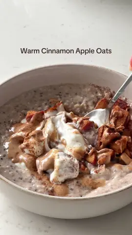 Warm cinnamon apple oats 🍎 Stewed apples are rich in soluble fibre and act as a prebiotic, feeding the beneficial bacteria in the gut, helping it multiply.  Cinnamon is also high in antioxidants, can relieve inflammation, stabilise blood sugar and protects heart health!  Overnight oats recipe: - 50g oats - 10g chia seeds - Around 250-300ml milk (add more in the morning if needed as the chia seeds soak up a lot of liquid) - 1 scoop vanilla protein - Dash of cinnamon Mix together and leave overnight in the fridge to soak.  Top your oats with warm cinnamon apples, greek yoghurt for a protein boost & drizzle of nut butter! 🥰 #overnightoats #stewedapples #prebiotics #guthealth #highprotein    
