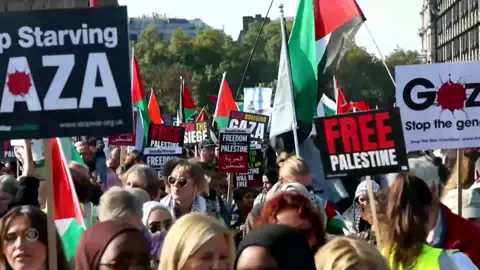 Thousands of pro-Palestinian protesters marched in London to mark two years since the Hamas-Israel war in Gaza, as police have been given sweeping powers to curb repeated demonstrations.