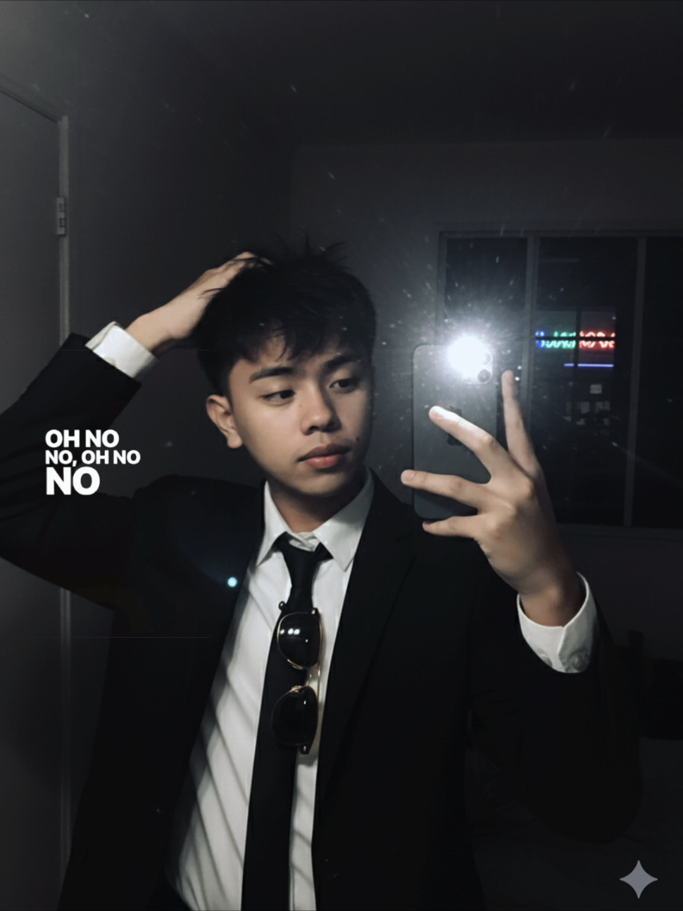 GEMINI AI PROMPT:Person in the image [DO NOT CHANGE SUBJECT'S FACIAL FEATURES] A very ordinary iPhone mirror selfie with no clear subject or framing; a careless snapshot. The photo has a little motion blur and is slightly overexposed due to uneven light. The angle is awkward, the composition is non-existent, and the overall effect is aggressively mediocre - like an accidental photo taken while taking the phone out of your pocket to take a selfie The subject takes a shaky iPhone mirror selfie at night, before he goes out. He wears a classic black suit jacket over a crisp white dress shirt, finished with a slim black tie that's slightly loosened at the collar and a sunglass. The white shirt cuff peeks from the sleeve He is styling his hair. in a dimly lit room with no lights on except for the harsh phone flashlight, which creates stark highlights and blown-out reflections. The phone is very close to the mirror. The photo has a vertical aspect ratio of 9:16. Neon lights are faintly visible from the outside. #CapCut #gemini #ai 