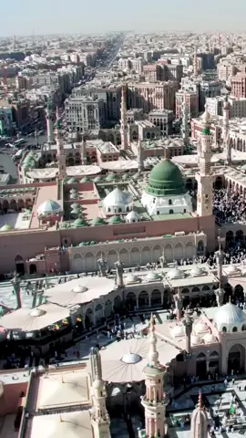 Madinah, the City of the Prophet, shines bright A beacon of faith, where Islam's history takes flight The Masjid an-Nabawi, a mosque of grandeur and might Where the Prophet Muhammad's tomb is a sacred sight The city's streets are lined with date palms, green and tall A tranquil oasis, where faith and peace enthrall Madinah's rich history and heritage are palpable and real A place where Muslims from all over the world come to feel The city's warm hospitality and welcoming smile Make it a place of pilgrimage, worth traveling a long while