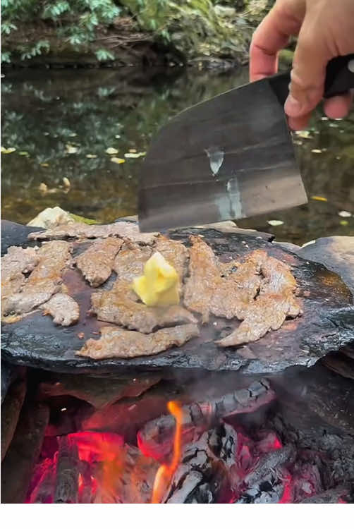 Beef steak grilled on hot rocks in nature 🥩🪵🔥🌲 #leon #cookingasmr #outdoorcooking #steak #beef 