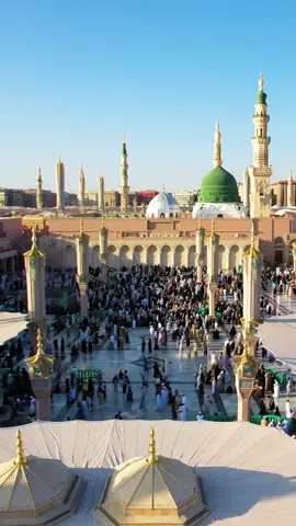 Madinah, the City of the Prophet, shines bright A beacon of faith, where Islam's history takes flight The Masjid an-Nabawi, a mosque of grandeur and might Where the Prophet Muhammad's tomb is a sacred sight The city's streets are lined with date palms, green and tall A tranquil oasis, where faith and peace enthrall Madinah's rich history and heritage are palpable and real A place where Muslims from all over the world come to feel The city's warm hospitality and welcoming smile Make it a place of pilgrimage, worth traveling a long while