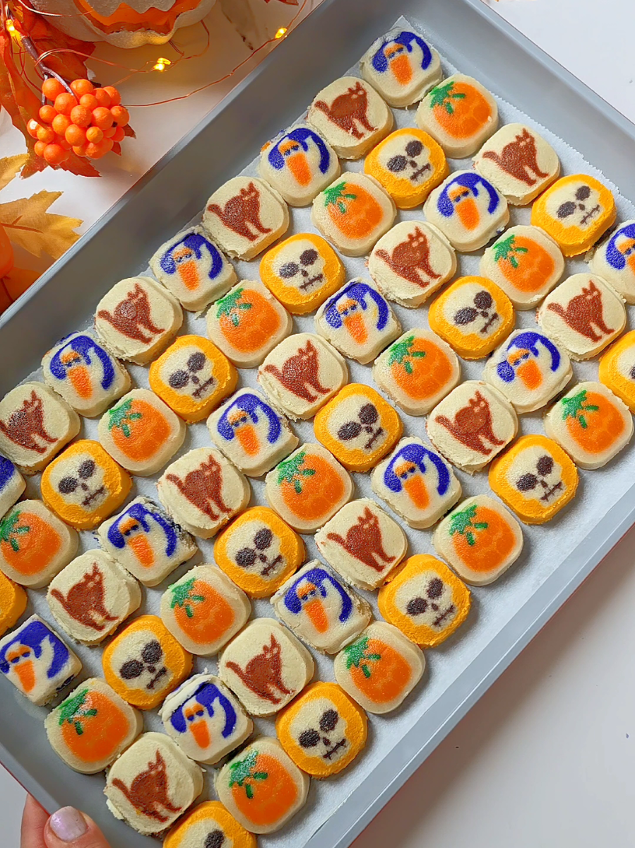 Spooky Cookie Bark!🍪🍫 Here is how to make it: Preheat oven to 325 F. Arrange the cookies on parchment paper lined baking sheet and bake on the middle rack for 12-15 minutes just until the outer edges are set. Remove from the oven and immediately add the chocolate bars; set aside for 5 minutes or so. Chocolate will soften up and melt from the heat of the cookies. Lightly swirl the softened chocolate with skewer or small spatula. Add your desired toppings (icing decor, cookies sprinkles) and freeze for 20-30 minutes until chocolate sets. Cut into shards, package, gift or enjoy! 🎃👻 #spookytreats #spookycute #halloweenideas #chocolatebark #cookies 