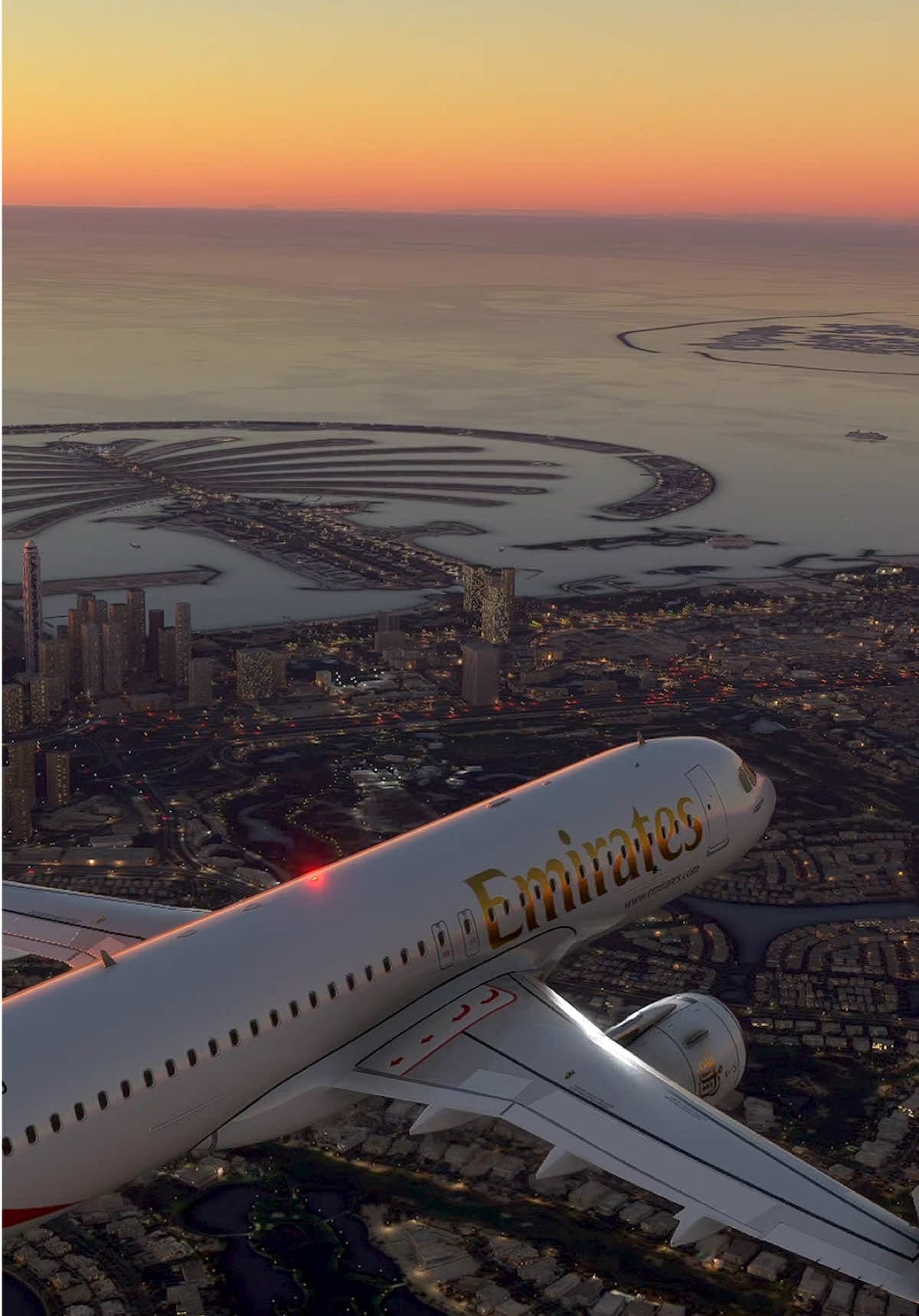 Emirates glowing in the evening sky, Dubai sparkling below 🌌💛 #aviation 