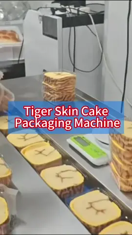 Do you know tiger skin cake packing machine?#packingmachine #packagingmachine #baggingmachine #machine #factory #packing #package #tigerskincake #cake #cakes #cakepackaging 