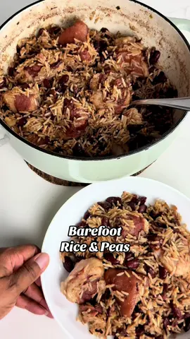 Barefoot Rice & Peas Recipe 🇯🇲  INGREDIENTS: 1 cup dry red peas or kidney beans, rinsed 1 lb salted pigtail 2 tbsp coconut oil 1/2 yellow onion, chopped 4 garlic cloves, smashed 2 scallion stalks, one chopped, one whole 10 pimento/allspice berries 4 sprigs of thyme 2 tsp ginger paste 2 cups coconut milk 1 tsp all-purpose seasoning 2 tsp brown sugar (optional) 2 scallion stalks 1 scotch bonnet pepper  2 cups long-grain rice, rinsed  2 tbsp butter INSTRUCTIONS: 1) Soak the peas in fresh water for 8 hours or overnight. 2) Cut the salted pigtail into pieces, and boil twice in fresh water to get rid of most of the salt and tenderize the meat. 3) Drain the pigtail and the soaked peas. 4) Add 1 tbsp coconut oil to a pot with the chopped onion, garlic, 1 chopped scallion, pimento, and ginger. Sauté until fragrant, then add the pigtail and peas to the pot. 5) Add 8 cups of water, cover, and boil over medium heat until the peas are soft enough to smash with a fork and pigtail is tender to your liking. (Note, there should be between 1.5 to 2 cups of liquid left in the pot.) 6) Stir in coconut milk, all-purpose seasoning, and brown sugar (optional - it just helps to cut the earthiness of the peas).  7) Boil for about 10 minutes, then add the rinsed rice, scallion stalk, thyme, scotch bonnet pepper, 1 tbsp of coconut oil, and 2 tbsp butter. Give the pot a final stir, bring to a low boil once more, then turn the heat down to low, and cover. 8) Steam over low heat for 35 minutes. Turn the heat off completely, then let sit with the lid still on for 10 additional minutes. Fluff the rice, and serve. . . #barefootriceandpeas #riceandpeas #jamaicanfood #onepotmeal #typhaniecooks
