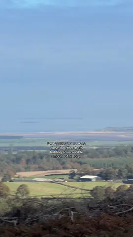 Bamburgh Castle and Lindisfarne Castle can both be seen at once from this location near St Cuthberts cave, overlooking so much history! #History #wow #castle #omg #fyp 