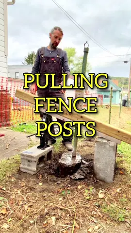 Pulling fence posts out of the ground is probably easier than you think, this is the method I used and it worked great. #fence #fenceposts #fencebuild #construction #DIY 