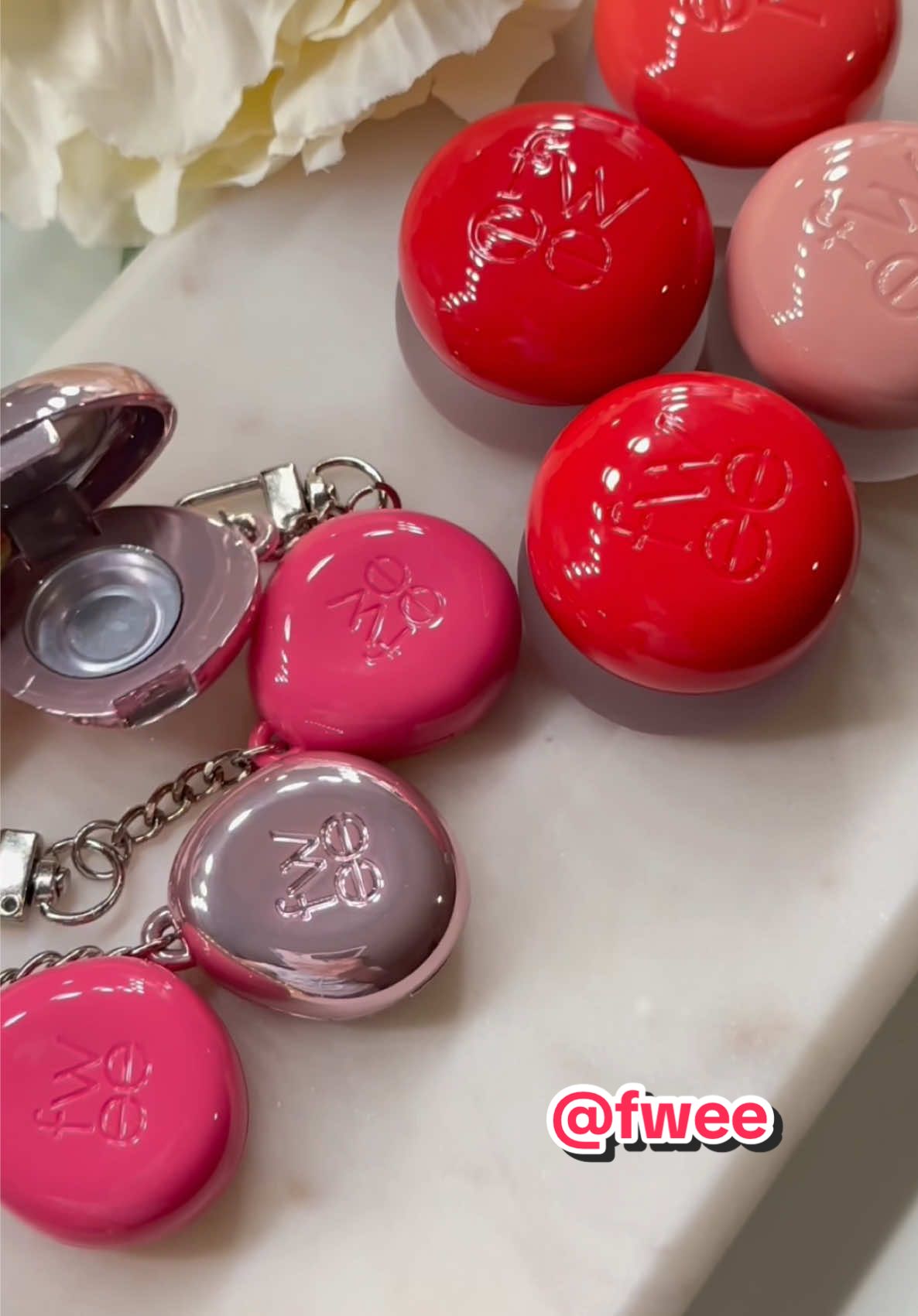 I am completely obsessed with these Fwee Lip and Cheek Pudding Pots 😍💕  The texture is delightfully soft and bouncy, blending seamlessly to give the most dreamy blurred effect on both lips and cheeks. I have four gorgeous shades—OH, Boy, Ambitious, and Mule—and each one is incredibly wearable and flattering 💄✨ Whether I want a natural everyday flush or a bold pop of color, these little pots are my go-to makeup must-haves. What makes them even more fun is the adorable keychains 🥰 I can keep extra product on the go without carrying the entire pot around, which is such a game-changer! ✨ The silicone applicator is another favorite—it glides so smoothly on the skin and makes blending effortless 💕 Lightweight, versatile, and travel-friendly, these Pudding Pots are truly a makeup essential that I cannot stop reaching for 😍 @fwee_global @fwee_makeup  @fwee_makeup_us @fwee  #kbeauty #wee #lipandcheek #fwee1mchallenge #koreanmakeup