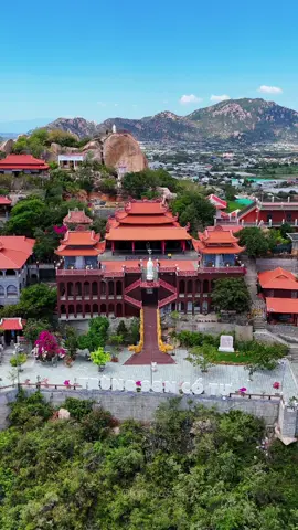 Trùng Sơn Cổ Tự – where the mountains meet the sea and peace meets the soul 🌄 Located on Da Chong Mountain (also called Phoenix Mountain) in Khanh Hai Town, Ninh Hai District, Ninh Thuan, Trùng Sơn Cổ Tự sits about 60 m above sea level. To reach it, visitors climb nearly 500 stone steps leading to breathtaking views of Ninh Chu Beach and Phan Rang City in the distance. #ninhthuan #dulichvietnam #flycamvietnam #djimini5pro #trungsoncotu 