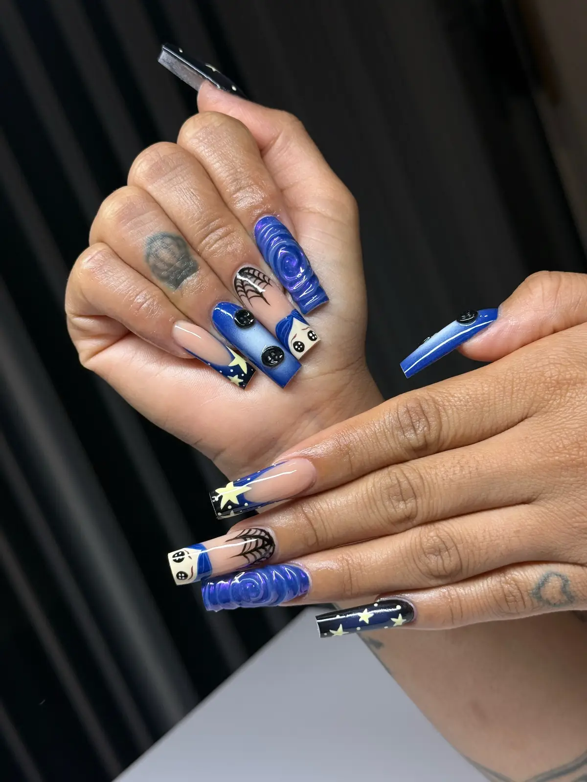 The buttons are my favorite part 🥹 This was my first time getting a request for Coraline nails I was so excited 😭💙 #nailart #coralinenails #halloweenails #nailinspo #nailtok 