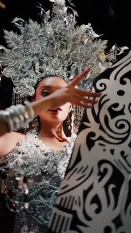 NATIONAL COSTUME MISS GRAND MALAYSIA 🇲🇾 @Viviana Lin Winston  The Queen of Terabai Iban is not just a warrior, she is a protector of heritage, a leader who wields the terabai (shield) as a powerful symbol of safeguarding her people, traditions and spirit. She embodies the perfect harmony between feminine grace and the strength of a battlefield guardian. The concept of the 